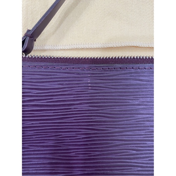 LOUIS VUITTON handbag
Color: Purple/Plum
Excellent Condition - Picture 7 of 7